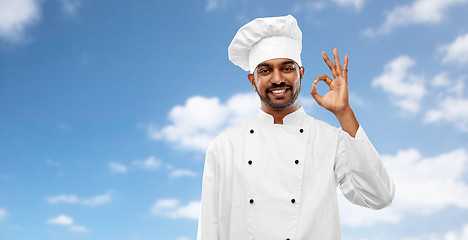 Image showing happy male indian chef in toque showing ok gesture