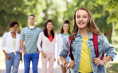 Image showing happy smiling teenage student girl with school bag