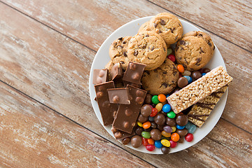 Image showing chocolate, cookies, candies and muesli bars