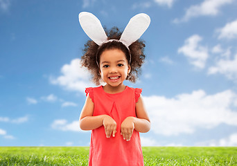 Image showing happy little girl wearing easter bunny ears