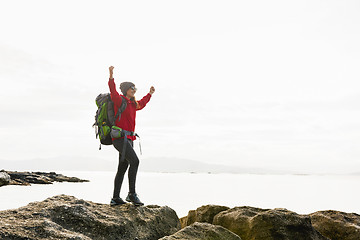 Image showing Woman exploring the coast