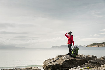 Image showing Woman exploring the coast