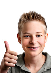 Image showing Young boy with his thumbs up with joy
