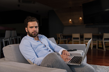 Image showing man working from home