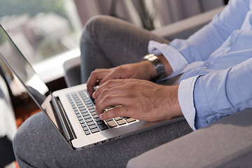 Image showing man working from home