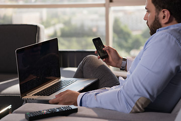 Image showing man working from home