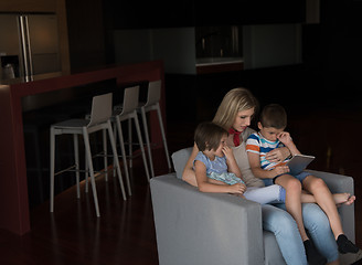 Image showing happy young mother spending time with kids