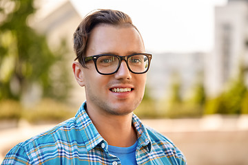 Image showing portrait of man in glasses outdoors in summer