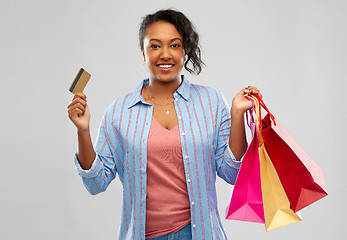 Image showing african american woman shopping with credit card