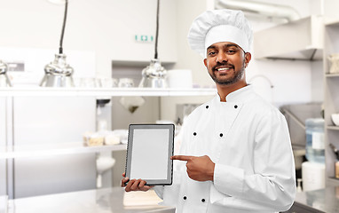 Image showing indian chef with tablet pc at restaurant kitchen