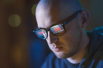 Image showing hacker with access denied reflecting in glasses