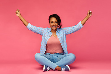 Image showing happy african american woman celebrating success