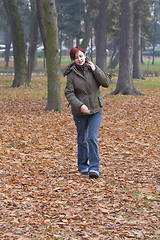 Image showing Girl in an autumn park