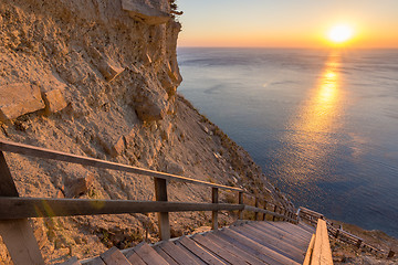 Image showing Mountain landscape, stairs descending to the sea