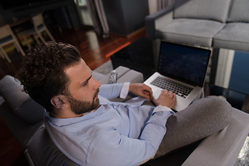 Image showing man working from home