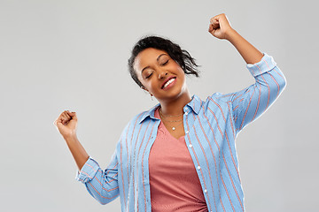 Image showing happy african american woman celebrating success