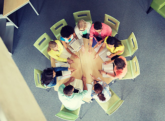 Image showing group of international students pointing finger