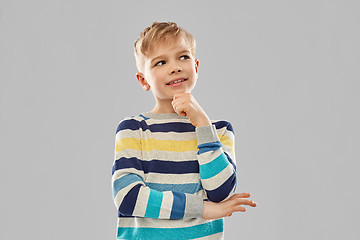 Image showing portrait of thinking boy in striped pullover