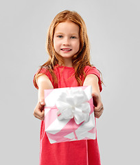 Image showing lovely red haired girl with birthday gift