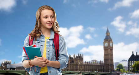 Image showing happy smiling teenage student girl with school bag