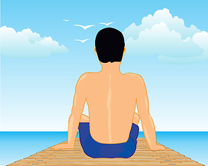 Image showing Man sitting on quay ashore ocean landscape