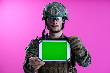 Image showing soldier showing a tablet with a blank green screen