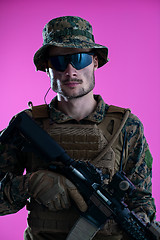 Image showing modern warfare soldier pink backgorund