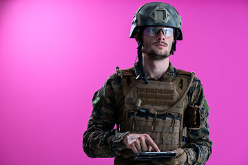 Image showing soldier using tablet computer closeup