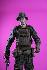 Image showing modern warfare soldier pink backgorund