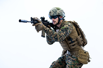 Image showing soldier in action aiming laseer sight optics