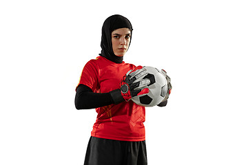 Image showing Arabian female soccer or football player, goalkeeper on white studio background