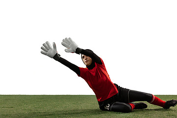 Image showing Arabian female soccer or football player, goalkeeper on white studio background