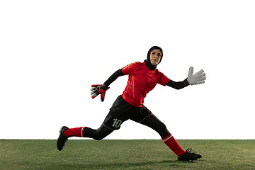 Image showing Arabian female soccer or football player, goalkeeper on white studio background