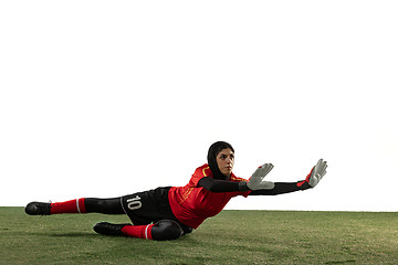 Image showing Arabian female soccer or football player, goalkeeper on white studio background