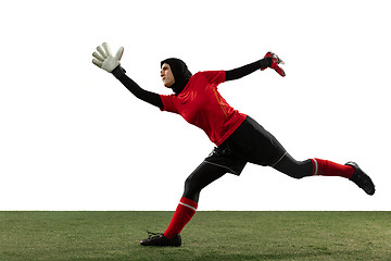 Image showing Arabian female soccer or football player, goalkeeper on white studio background