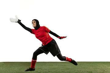 Image showing Arabian female soccer or football player, goalkeeper on white studio background