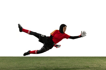 Image showing Arabian female soccer or football player, goalkeeper on white studio background