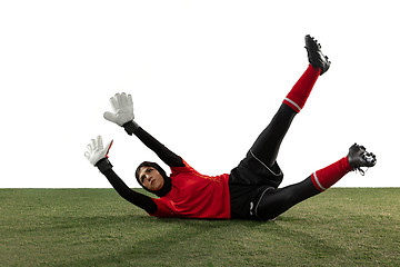 Image showing Arabian female soccer or football player, goalkeeper on white studio background