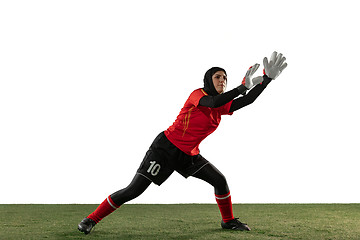 Image showing Arabian female soccer or football player, goalkeeper on white studio background