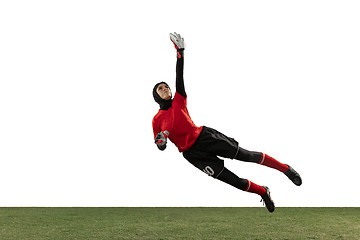 Image showing Arabian female soccer or football player, goalkeeper on white studio background