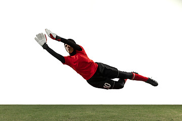 Image showing Arabian female soccer or football player, goalkeeper on white studio background