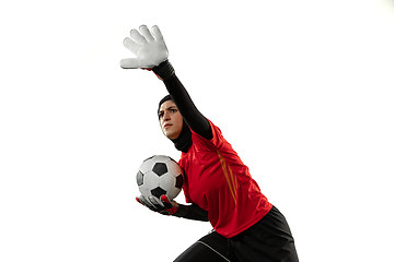 Image showing Arabian female soccer or football player, goalkeeper on white studio background