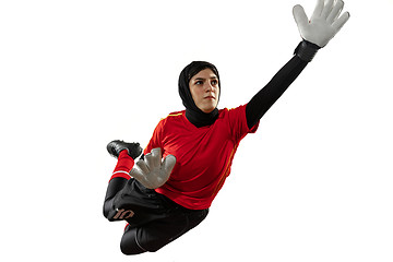 Image showing Arabian female soccer or football player, goalkeeper on white studio background