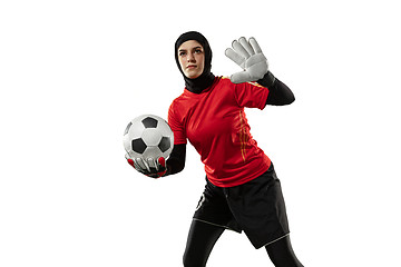 Image showing Arabian female soccer or football player, goalkeeper on white studio background