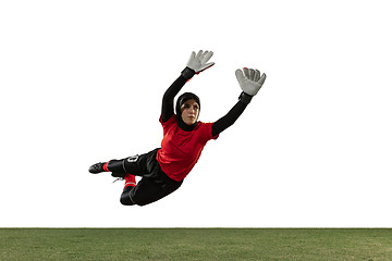 Image showing Arabian female soccer or football player, goalkeeper on white studio background