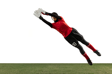 Image showing Arabian female soccer or football player, goalkeeper on white studio background