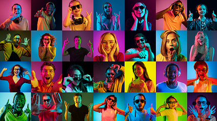 Image showing Portrait of multiethnic group on multicolored background in neon light