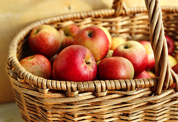 Image showing Close-up of bright tasty apples in a basket