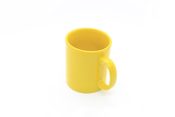 Image showing Bright yellow ceramic cup