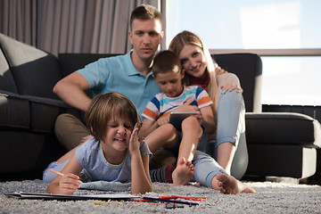 Image showing young couple spending time with kids